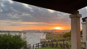 Villetta a schiera con giardino, vista mozzafiato e accesso a piscina